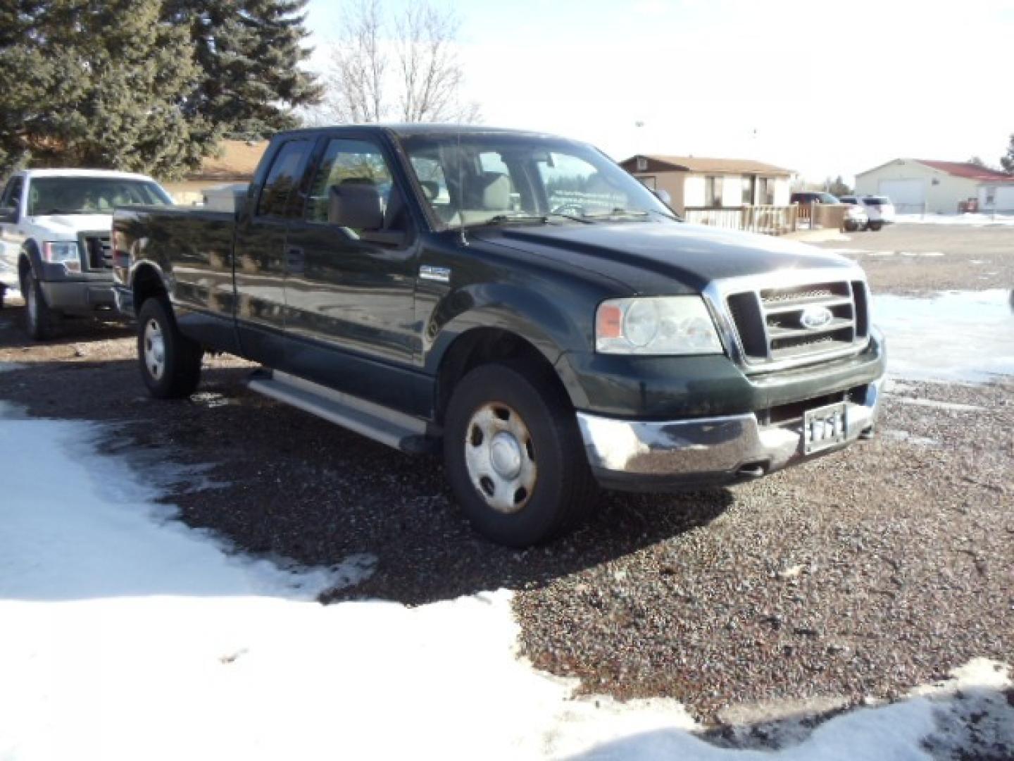 2004 Green /Gray Ford F-150 XL (1FTVX14504N) with an V8, 5.4L; SOHC engine, Automatic transmission, located at 5465 Highway 2 W., Columbia Falls, MT, 59912, (406) 892-4407, 48.352188, -114.240929 - Cruise control AC Tilt Wheel Towing - Photo#0